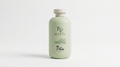 A light sage green bottle of TYZ Beauty Hidratante & Reparativo Shampoo, featuring a white cap, set against a clean white background.
